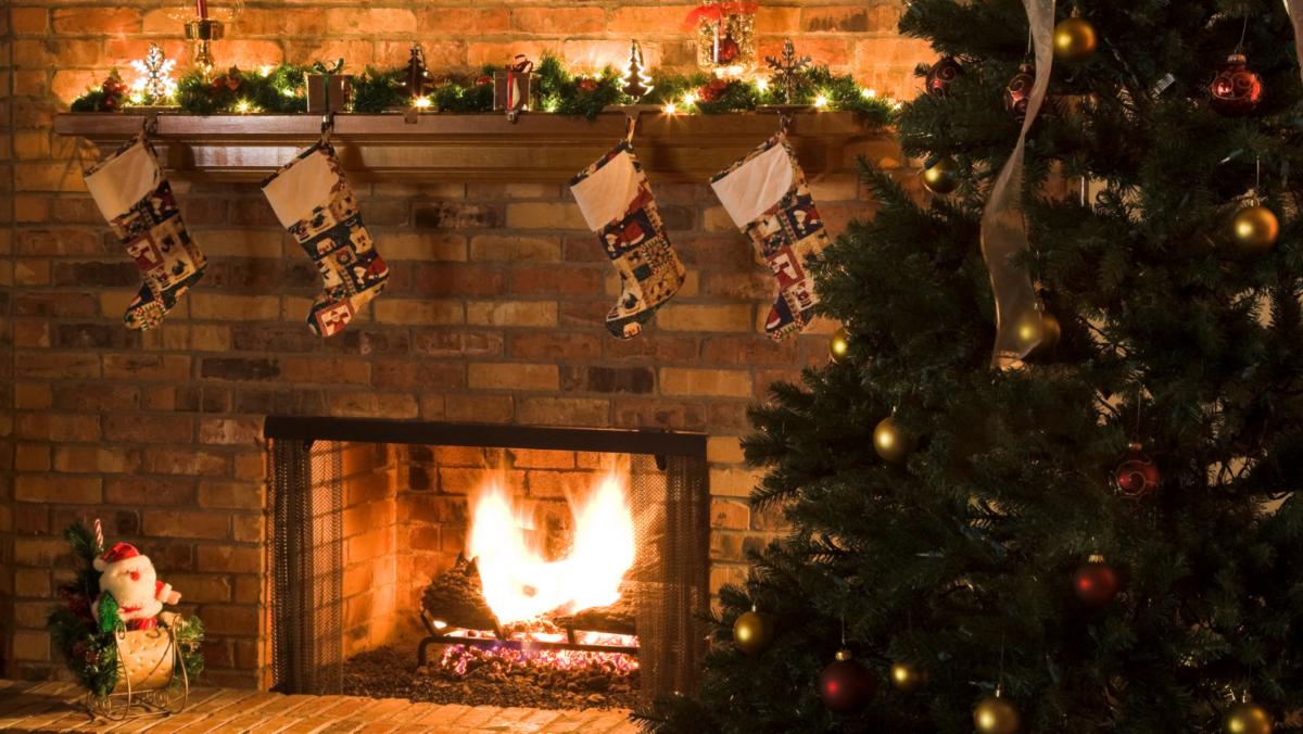 fireplace at home with christmas decor and tree